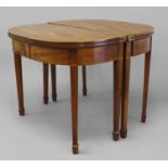 A PAIR OF GEORGE III MAHOGANY CARD TABLES, each with 'D' shaped tops with satinwood stringing