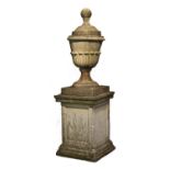 A LARGE RECONSTITUTED STONE GARDEN URN ON PEDESTAL, the urn with domed top and ball finial on a