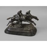 A 19TH CENTURY STYLE BRONZE OF RACING JOCKEYS, two racing jockeys jumping a fence, cast and