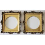 A PAIR OF PICTURE FRAMES Each narrow border with scrolls and flowerheads, shell motifs to the