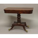 A REGENCY MAHOGANY FOLD TOP TEA TABLE, the shaped top with rosewood crossbanding enclosing a