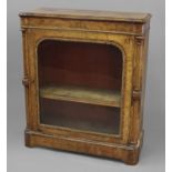 A VICTORIAN BURR WALNUT PIER CABINET, the rectangular top with a moulded border above a decorative