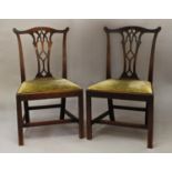 A PAIR OF GEORGE III CHIPPENDALE STYLE DINING CHAIRS, each with scrolling top rails and gothic-