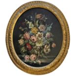 MICHAEL SCHILL (19th Century) AN URN OF MIXED FLOWERS Signed, oil on canvas, oval 74.5 x 62.