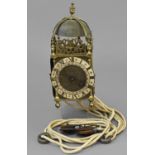 A BRASS LANTERN CLOCK SIGNED 'STAFFORD FREEMAN' LONDON, the silvered chapter ring with Roman