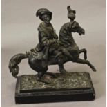 A BRONZE FIGURE OF A NOBLEMAN ON HORSE BACK, the figure wearing a broad hat with feather and 16th