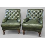 A PAIR OF GREEN LEATHER CLUB TYPE ARMCHAIRS, each with broad button upholstered backs and deep seats