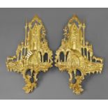 A PAIR OF CARVED AND GILT ROCOCO STYLE WALL MOUNTS AFTER THOMAS JOHNSON, each carved in the