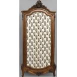 A LOUIS XV STYLE WALNUT ARMOIRE, with a scrolling cornice with central rococo style carved