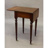 A VICTORIAN MAHOGANY DROP FLAP SIDE TABLE, the rectangular top with twin drop flap sides with