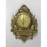 FRENCH GILT WOOD CARTEL STYLE CLOCK, the 7" dial on a brass, eight day movement, flanked by winged