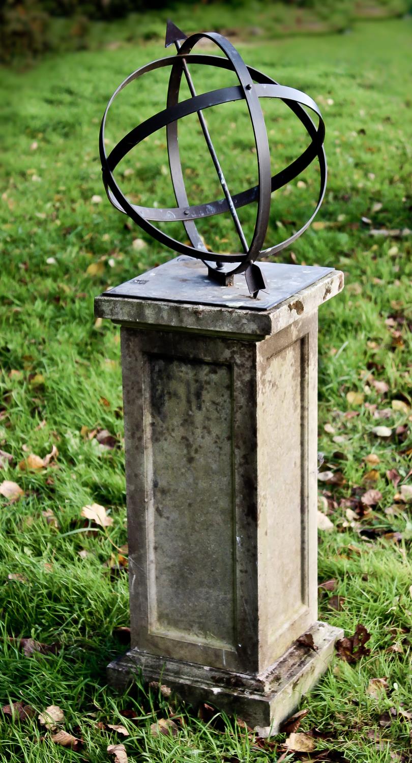 A CELESTIAL GLOBE ON PLINTH BASE, the globe with arrow pointer on a square base with engraved