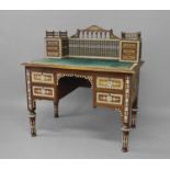 A MOORISH STYLE MOROCCAN WRITING DESK, the elaborate desk all over inlaid with bone, ebony and