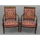 A PAIR OF FRENCH EMPIRE ARMCHAIRS, with rectangular mahogany framed backs with scrolling stylized