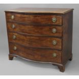 A GEORGE III MAHOGANY SERPENTINE FRONTED CHEST OF DRAWERS, the broad shaped top with serpentine