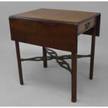 A GEORGE III MAHOGANY PEMBROKE TABLE, the rectangular top with drop flap sides with moulded edge,