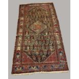 UNUSUAL SHIRVAN RUG, South West Caucasus, circa 1900. The midnight blue field of boteh around a