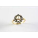 A VICTORIAN DIAMOND AND PEARL CLUSTER RING the central pearl in closed back setting and set within a