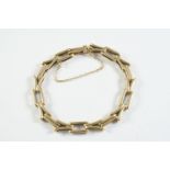 A 9CT GOLD FANCY LINK BRACELET 18cm long, 16.1 grams