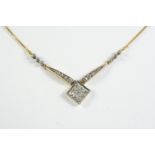A DIAMOND AND GOLD NECKLACE the 18ct gold fine link chain is mounted with graduated old circular-cut