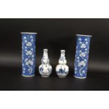 PAIR OF CHINESE GOURD SHAPED VASES a pair of late 19thc gourd shaped blue and white vases, painted