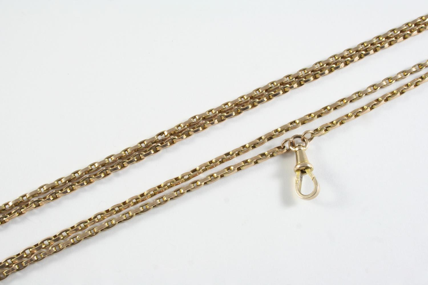 A 9CT GOLD OVAL LINK WATCH CHAIN 117cm long, 21.2 grams
