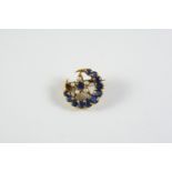 A SAPPHIRE AND PEARL CLOSED CRESCENT AND STAR BROOCH mounted with graduated oval-shaped sapphires