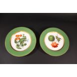 PAIR OF COALPORT PLATES each with green rims and gilded borders, one painted with an apple and