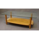 MODERN ERCOL COFFEE TABLE an unusual coffee table with a light elm shelf, with tapering legs
