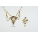 AN ART NOUVEAU GOLD AND PEARL SET PENDANT the foliate openwork mount suspends a cultured pearl, with