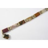 A SCOTTISH AGATE PANEL BRACELET formed with rectangular-shaped sections of assorted agates with