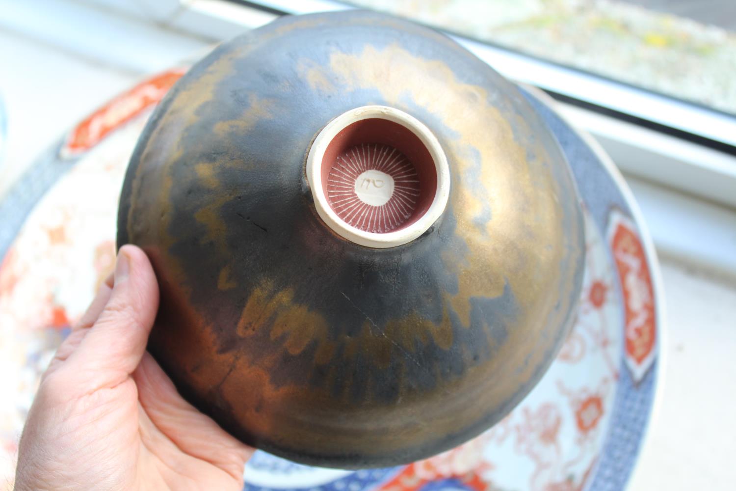 LUCIE RIE (1902-1995) - PORCELAIN BOWL a porcelain footed bowl with a bronze and black drip effect - Image 9 of 20