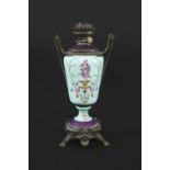 CONTINENTAL PORCELAIN OIL LAMP the oil lamp with a porcelain body, painted with classical figures