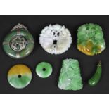 CHINESE JADE & JADEITE CARVINGS including a large circular pendent with metal discs to each side and