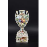 CARL THIEME AT POTSCHAPPEL - URN & STAND a two handled porcelain urn, painted with various figures