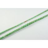 A SINGLE ROW GRADUATED JADE BEAD NECKLACE the jade beads graduate from approximately 3.9mm to 10.0mm