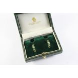 A PAIR OF EMERALD AND DIAMOND HALF HOOP EARRINGS each earring set alternately with circular-cut