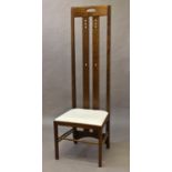 MACKINTOSH STYLE OAK HIGH BACK CHAIR a modern oak high back chair with cut out sections to each