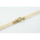 A CULTURED PEARL AND DIAMOND BRACELET the uniform cultured pearls measure approximately 4.7mm and