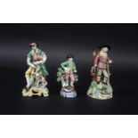 PEARLWARE FIGURES including a figure of a Bagpipe player with Dog by his feet (restored and