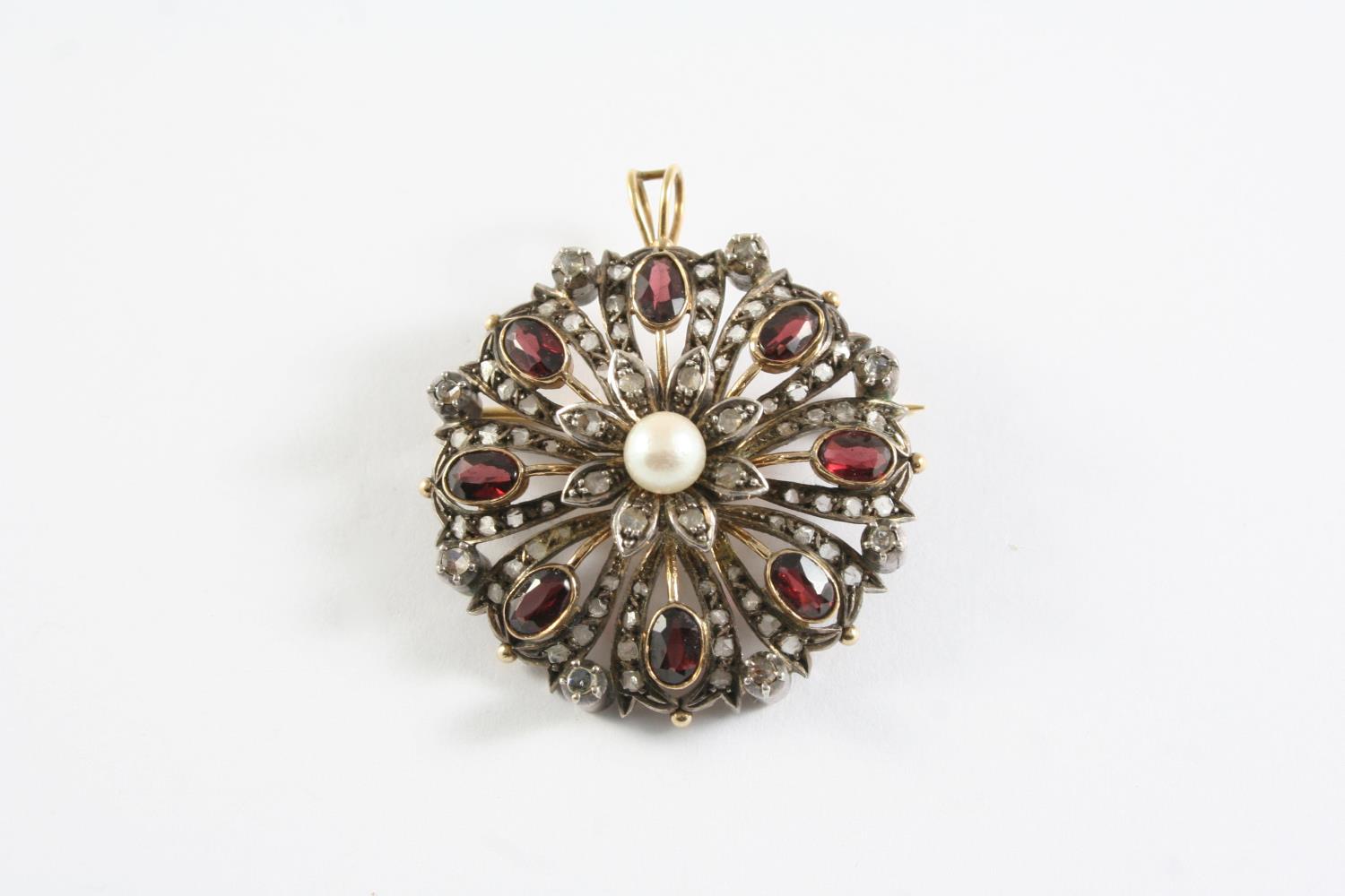 A VICTORIAN GARNET AND DIAMOND BROOCH PENDANT the flowerhead brooch is centred with a small pearl