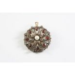 A VICTORIAN GARNET AND DIAMOND BROOCH PENDANT the flowerhead brooch is centred with a small pearl