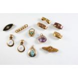 A QUANTITY OF JEWELLERY including an amethyst and 9ct gold fob, a Victorian 15ct gold brooch mounted