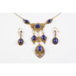 A LAPIS LAZULI AND GOLD NECKLET the intricate gold openwork necklet is mounted with oval lapis