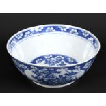 LARGE CHINESE BOWL a large 19thc blue and white porcelain bowl, the two panels painted with Birds in