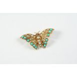 A TURQUOISE AND PEARL BUTTERFLY BROOCH formed with four graduated half pearls to the body, with