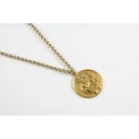 A 9CT GOLD ST. CHRISTOPHER PENDANT hallmarked for Birmingham 1975, on a 9ct gold circular link