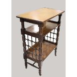 LIBERTY & CO SIDE TABLE An oak three tier table of Moorish influence, with a rectangular flat top