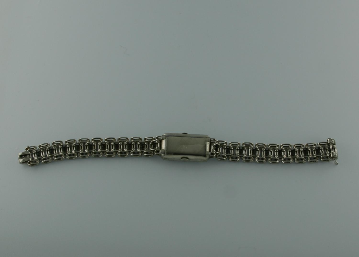 AN ART DECO LADY'S DIAMOND COCKTAIL WRISTWATCH millegrain set overall with circular-cut diamonds, - Image 6 of 6