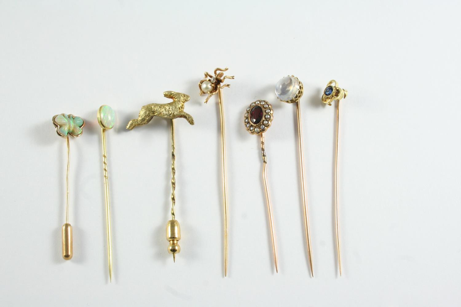 TWENTY SIX ASSORTED STICK PINS a garnet and seed pearl cluster stick pin, a gold stick pin mounted - Image 2 of 3